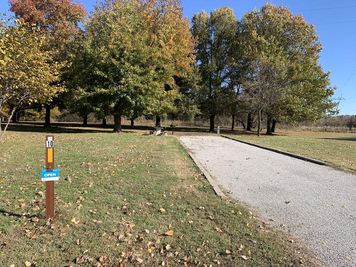 A photo of Site 10 of Loop  at Brush Creek Public Use Area with Picnic Table, Electricity Hookup, Fire Pit, Tent Pad, Lantern Pole, Water Hookup