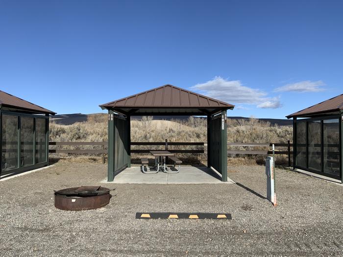 A photo of Site B-8 of Loop Main loop at Egin Lakes Campground/Day Use Area with Picnic Table, Electricity Hookup, Fire Pit, Lean To / Shelter
