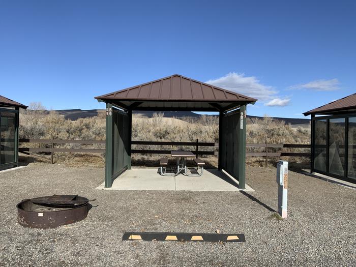 A photo of Site B-9 of Loop Main loop at Egin Lakes Campground/Day Use Area with Picnic Table, Electricity Hookup, Fire Pit, Lean To / Shelter
