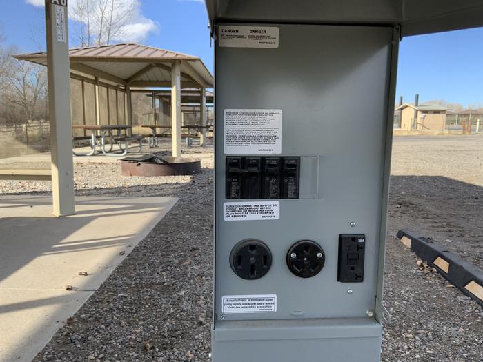 Electrical pedestal with 50amp, 30amp, and 120v hookups. Located at each campsite.