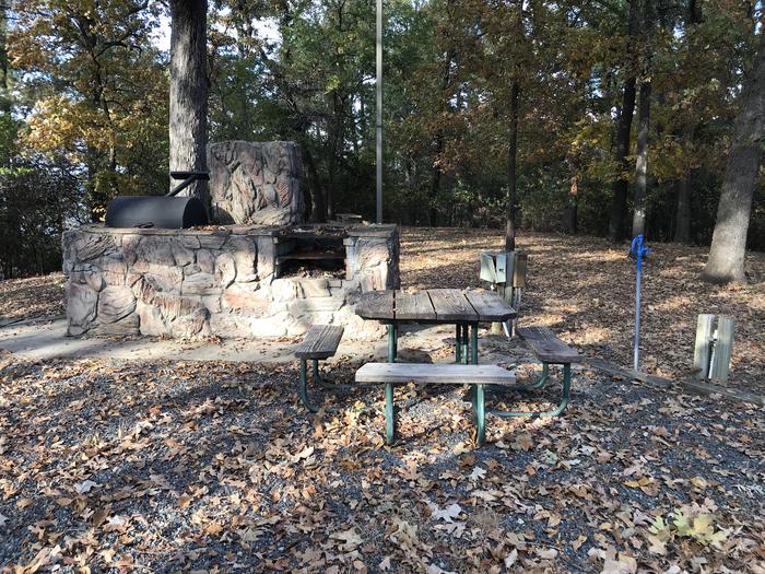 Photo of barbecue pit area at Piney Point group shelter.