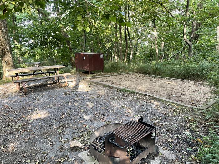 A photo of Site 015 of Loop Upper Loop at Loft Mountain Campground with Picnic Table, Fire Pit, Food Storage, Tent Pad