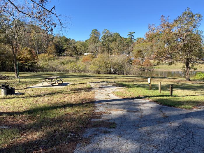 A photo of Site 27 of Loop LOOA at SAN AUGUSTINE with Picnic Table, Electricity Hookup, Fire Pit, Waterfront, Lantern Pole, Water Hookup
