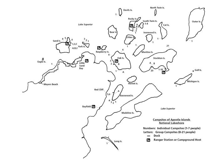 Camping mapA black & white image of the islands and mainland within Apostle Islands National Lakeshore. The islands have numbers and letters indicating the location of those sites. There is a legend on the bottom right of the screen explaining the letters and numbers, along with dock and ranger or campground host images for the key. 