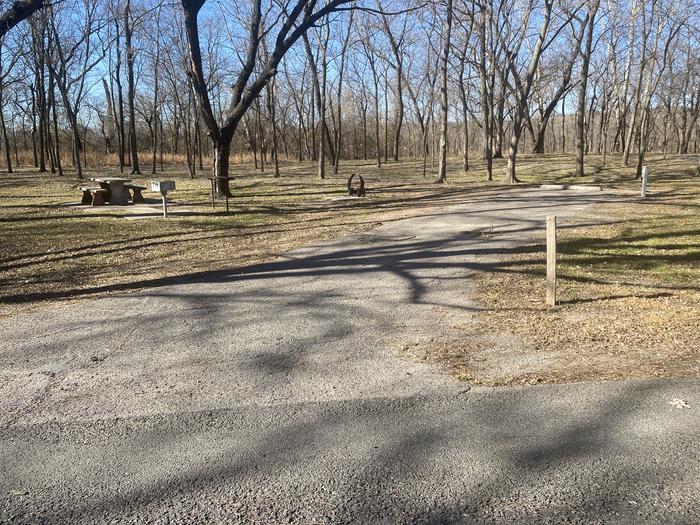 A photo of Site 4 of Loop Main at Sandy Park with Boat Ramp, Picnic Table, Electricity Hookup, Fire Pit, Shade, Tent Pad, Water Hookup