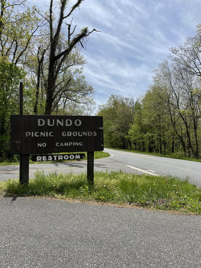 A photo of facility entrance to Dundo Group Campground with No Amenities Shown