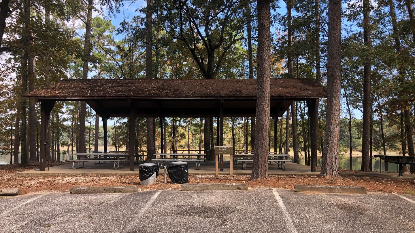 Caddo Drive PavilionGroup use shelter with electricity, tables, grills, water spigot, and swimming area.