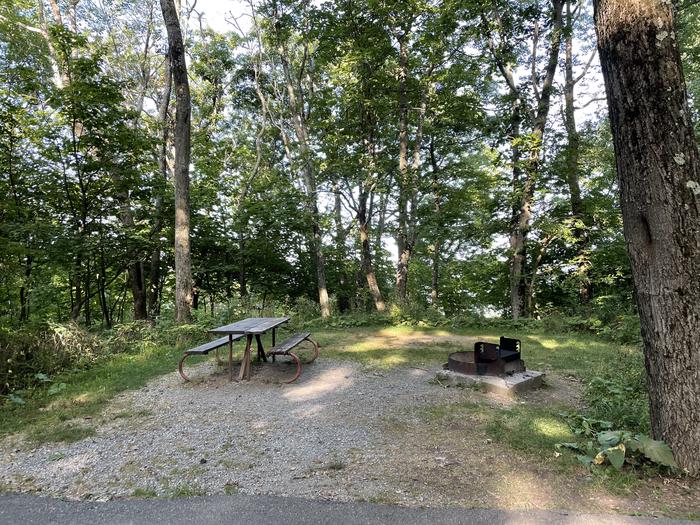 A photo of Site A056 of Loop A Loop at Loft Mountain Campground with Picnic Table, Fire Pit