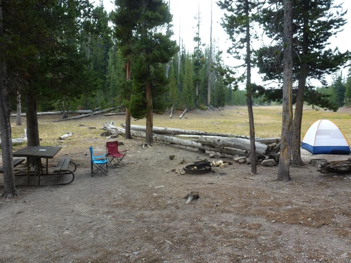 Lewis Lake site 15 with picnic table, camp chairs, fire ring, and tent.Lewis Lake site 15 