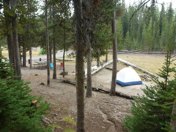 Lewis Lake site 15 with picnic table, camp chairs, tent, and parking area.Lewis Lake site 15 