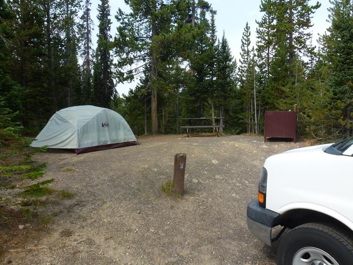 Lewis Lake site 21 a tent, picnic table, bear box, and a vehicle.Lewis Lake site 21