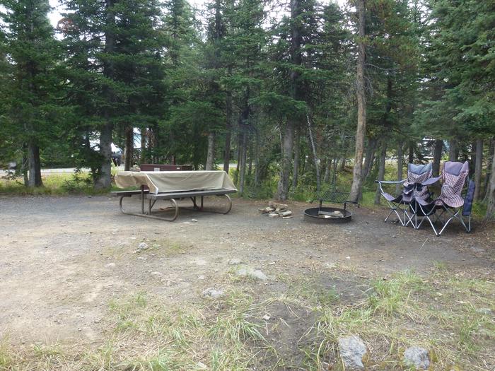 Lewis Lake site 24 picnic table, fire ring, and camping equipment. Lewis Lake site 24