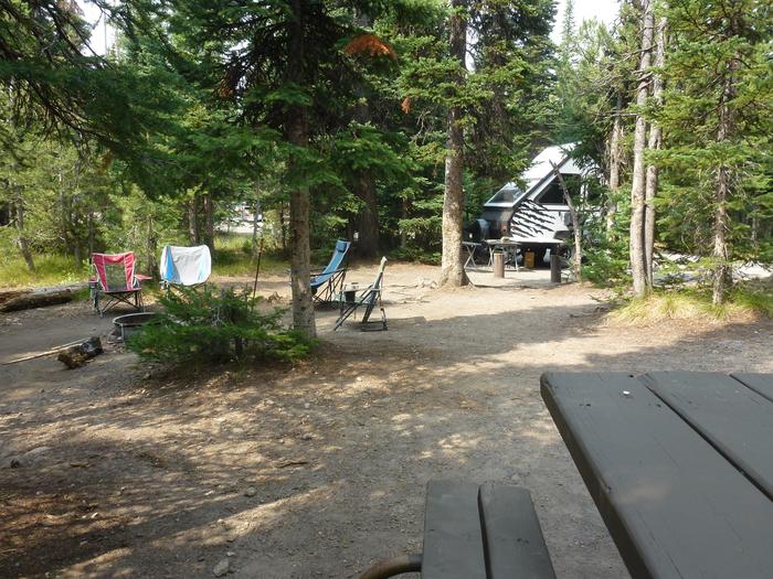 Lewis Lake site 44 picnic table and camping equipment.Lewis Lake site 44