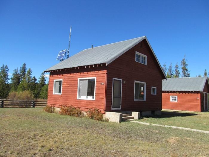 Paddy Flat Cabin West - building with red exterior and grey roofPaddy Flat Cabin West exterior