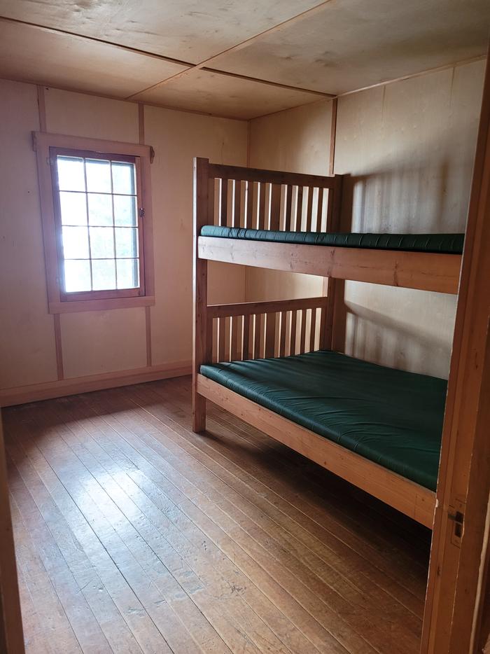 The cabin features 3 bedrooms, all with full sized bunkbeds.