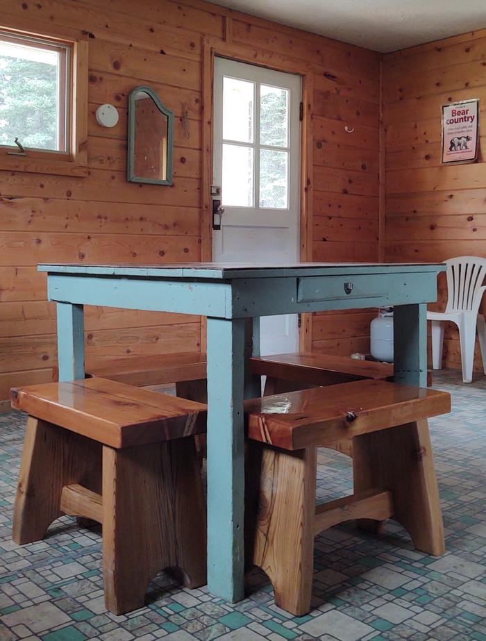 Podunk Guard Station KitchenCabin kitchen table and benches