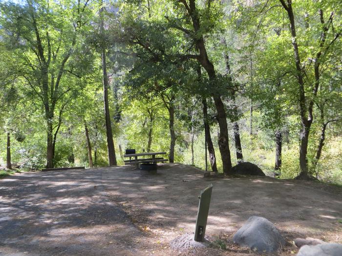 Pine Flat West Campground Site 13Standard non electric Oak Creek side picnic table, grill, and campfire ring.