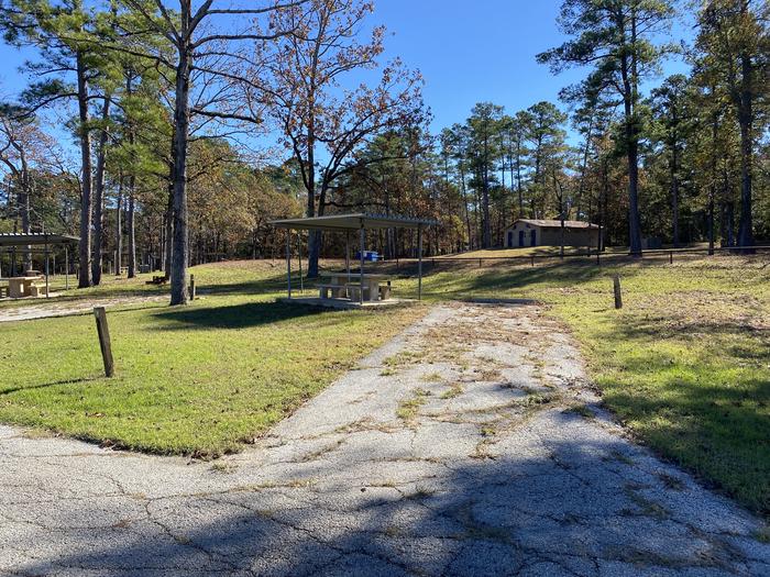 A photo of Site 07 of Loop LOOA at SAN AUGUSTINE with Picnic Table, Electricity Hookup, Fire Pit, Waterfront, Lantern Pole, Water Hookup, Lean To / Shelter