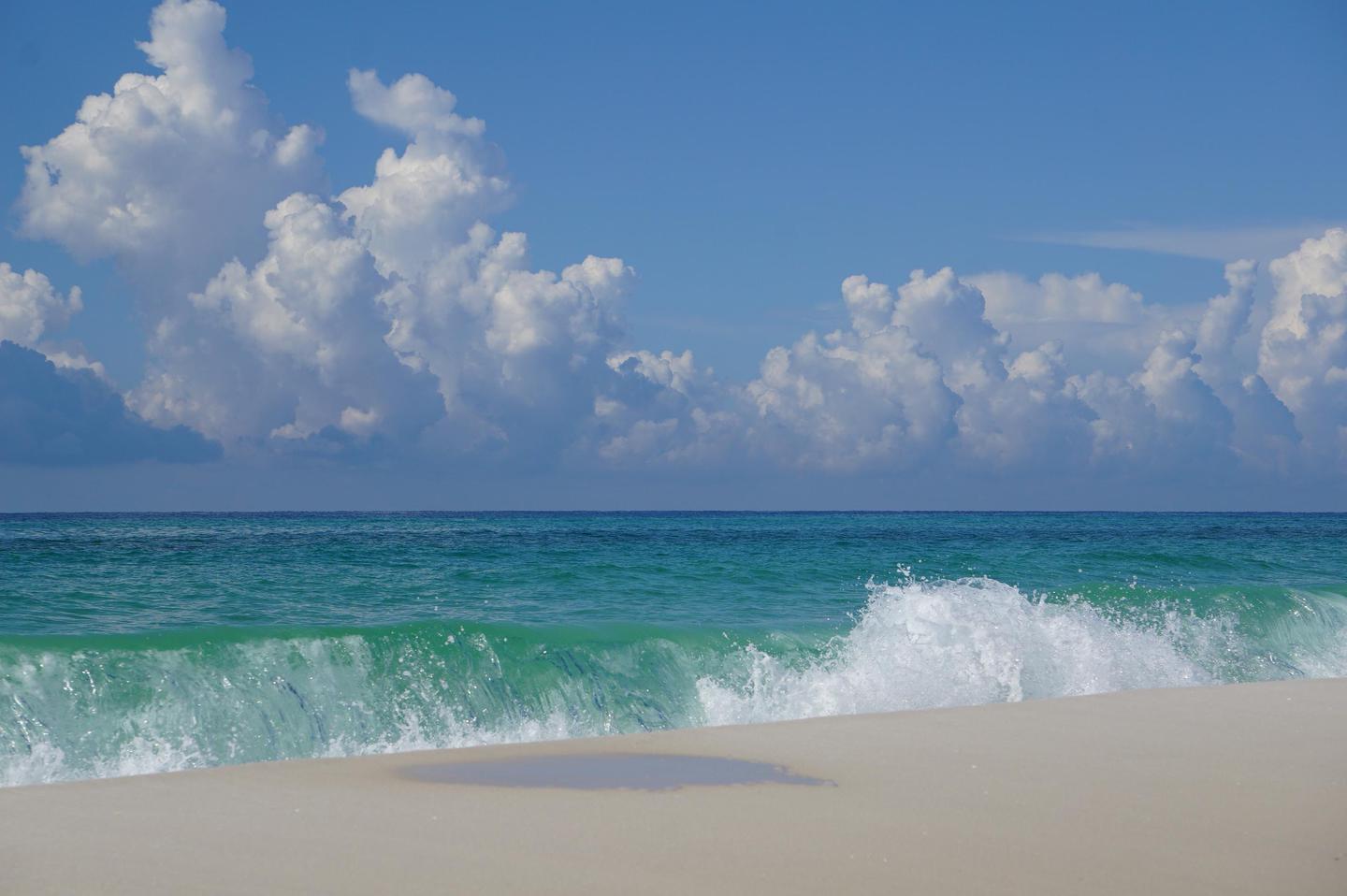 Beach SceneBlue-green waves crash on the white sand beaches of Gulf Islands National Seashore.