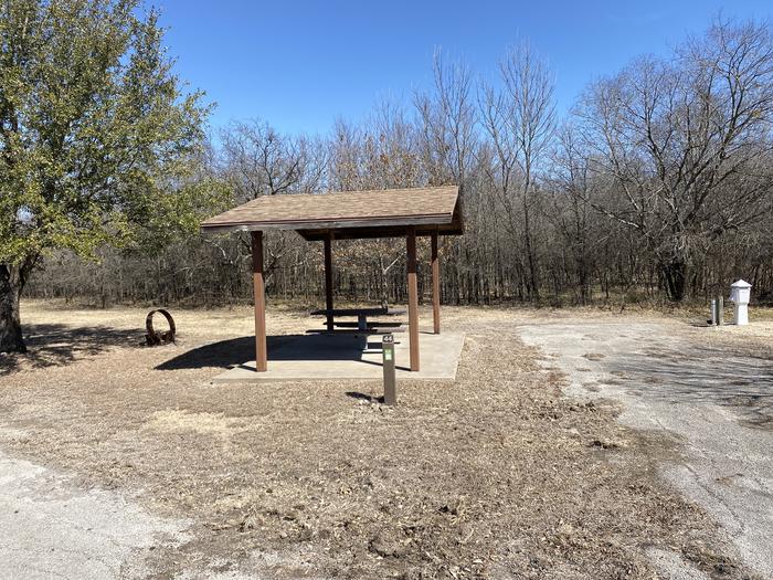 A photo of Site 44 of Loop BEAR CREEK  at BEAR CREEK with Picnic Table, Electricity Hookup, Fire Pit, Shade, Water Hookup
