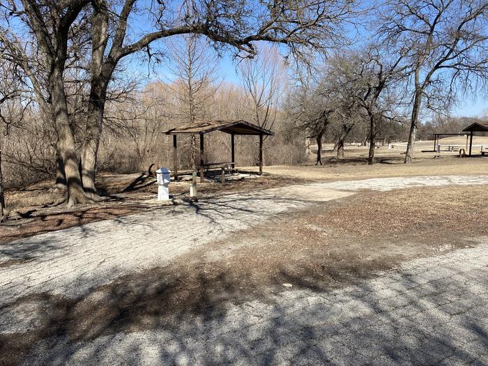 A photo of Site 11 of Loop BEAR CREEK  at BEAR CREEK with Picnic Table, Electricity Hookup, Fire Pit, Shade, Water Hookup