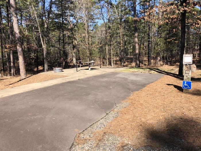 A photo of Site 050 of Loop NORTH SHORE at CEDAR LAKE (OKLAHOMA) with Picnic Table, Fire Pit, Tent Pad, Lantern Pole