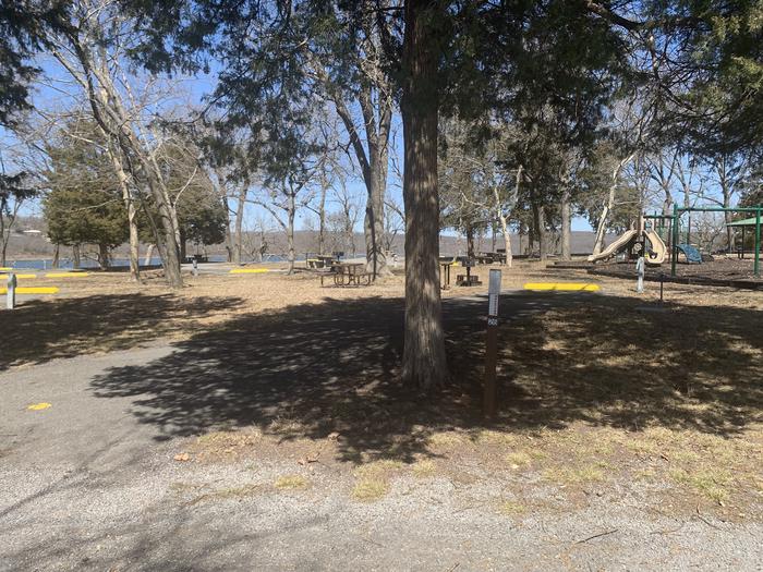 A photo of Site 26 of Loop SLAN at STRAYHORN LANDING with Picnic Table, Electricity Hookup, Fire Pit, Water Hookup