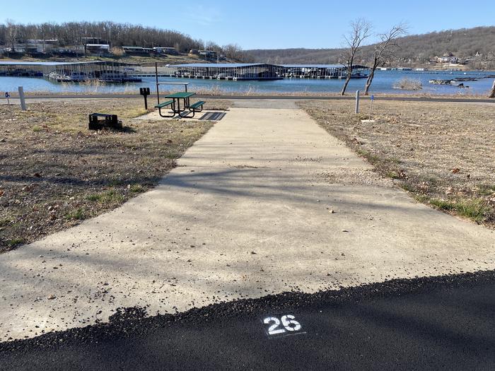 A photo of Site 026 of Loop SCRE at SNAKE CREEK with Picnic Table, Electricity Hookup, Fire Pit, Waterfront, Lantern Pole, Water Hookup
