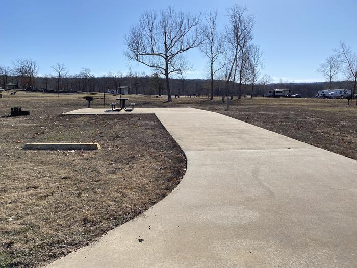 A photo of Site 040 of Loop 0512 at SNAKE CREEK with Picnic Table, Electricity Hookup, Fire Pit, Waterfront, Lantern Pole, Water Hookup