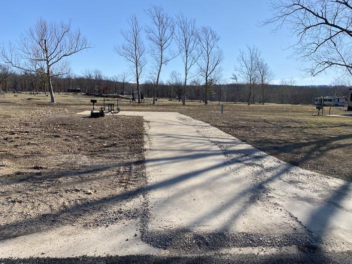 A photo of Site 039 of Loop 0512 at SNAKE CREEK with Picnic Table, Electricity Hookup, Fire Pit, Waterfront, Lantern Pole, Water Hookup