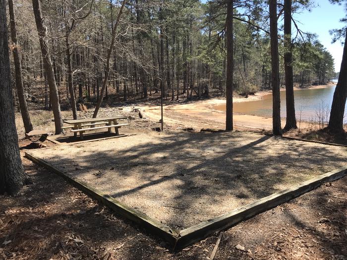 A photo of Site KK-09 of Loop LOOL at Holiday (Georgia) with Picnic Table, Fire Pit, Shade, Tent Pad, Lantern Pole, Water Hookup