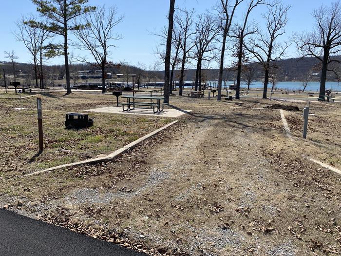 A photo of Site 058 of Loop 0512 at SNAKE CREEK with Picnic Table, Electricity Hookup, Fire Pit, Water Hookup