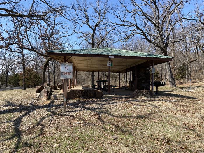 A photo of Site S003 of Loop 0512 at SNAKE CREEK with Picnic Table, Electricity Hookup, Fire Pit, Shade, Water Hookup. Shelter/Pavilion 