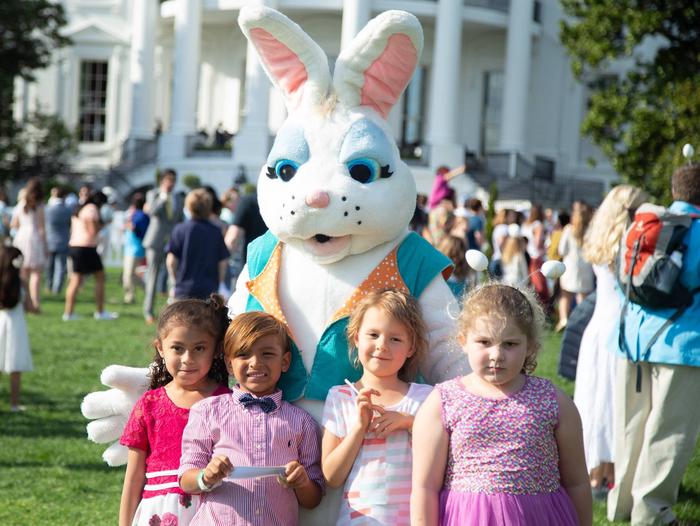The Easter Bunny with a group of childrenThe Easter Bunny with guests attending the White House Easter Egg Roll, on the South Lawn of the White House.