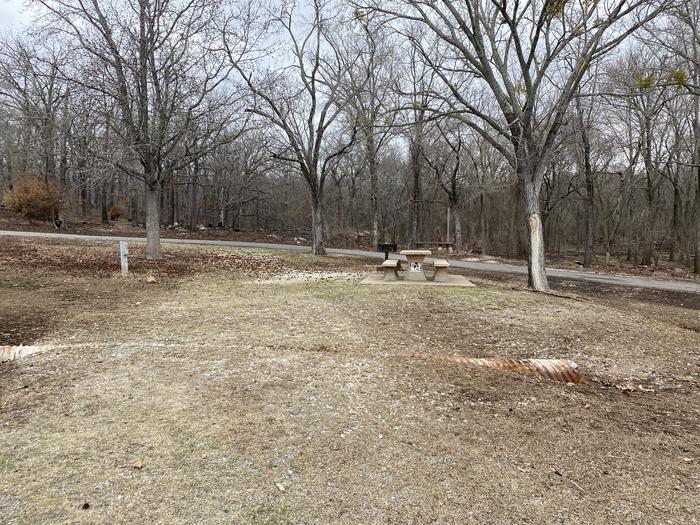 A photo of Site 102 of Loop CHICKEN CREEK  at CHICKEN CREEK with Picnic Table, Electricity Hookup, Fire Pit, Shade