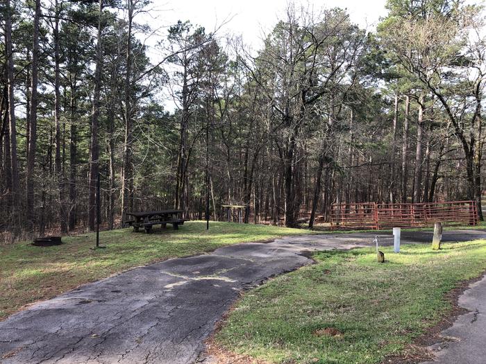 A photo of Site 020 of Loop HCMR at CEDAR LAKE (OKLAHOMA) with Picnic Table, Electricity Hookup, Fire Pit, Shade, Lantern Pole, Water Hookup
