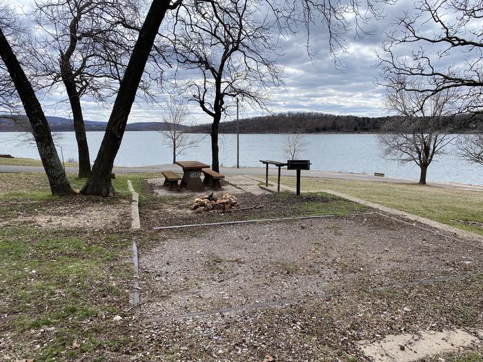 A photo of Site 095 of Loop 0512 at COOKSON BEND with Picnic Table, Fire Pit, Shade, Waterfront
