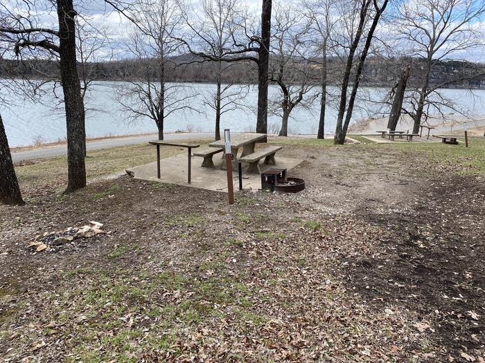 A photo of Site 082 of Loop 0512 at COOKSON BEND with Picnic Table, Fire Pit, Shade