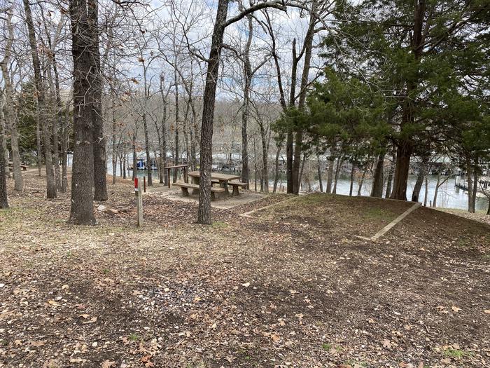 A photo of Site 119 of Loop 0512 at COOKSON BEND with Picnic Table, Fire Pit, Shade, Tent Pad