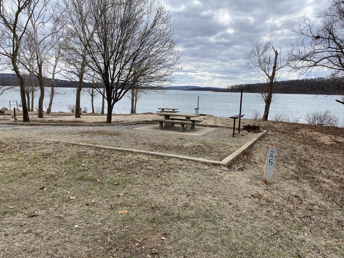A photo of Site 025 of Loop CBEN at COOKSON BEND with Picnic Table, Electricity Hookup, Fire Pit, Shade, Waterfront, Water Hookup