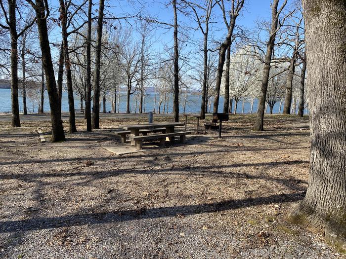 A photo of Site 008 of Loop CBEN at COOKSON BEND with Picnic Table, Electricity Hookup, Fire Pit, Shade, Tent Pad