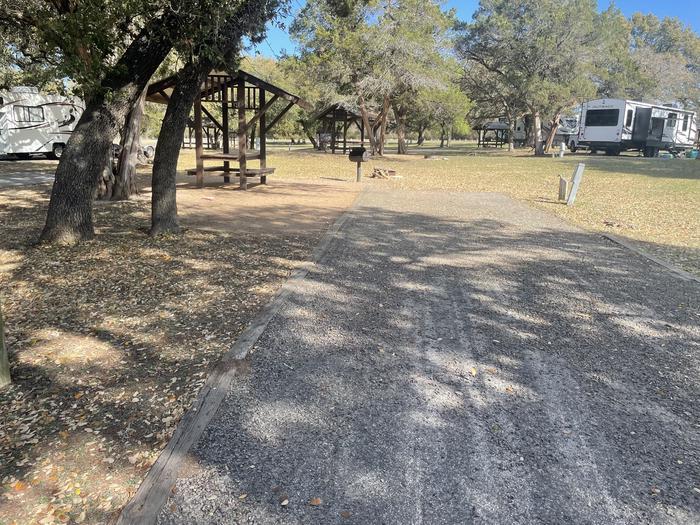 A photo of Site 57 of Loop FIFT at CEDAR RIDGE (TX) with Picnic Table, Electricity Hookup