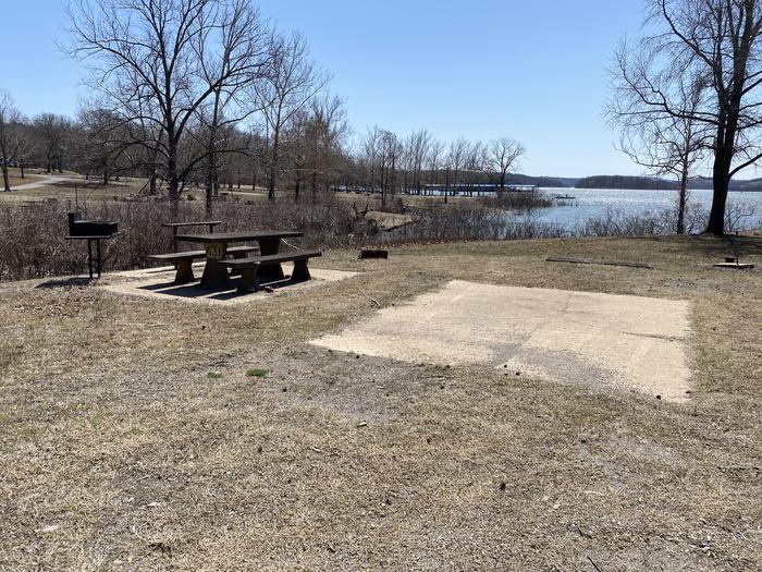 A photo of Site A31 of Loop PBAI at PETTIT BAY with Picnic Table, Fire Pit, Tent Pad, Waterfront, Water Hookup