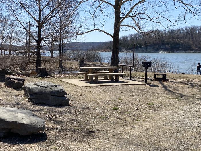 A photo of Site A29 of Loop PBAI at PETTIT BAY with Picnic Table, Fire Pit, Shade, Waterfront, Water Hookup