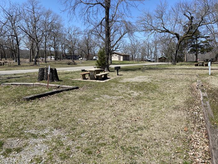 A photo of Site 07 of Loop PBA2 at PETTIT BAY with Picnic Table, Electricity Hookup, Fire Pit