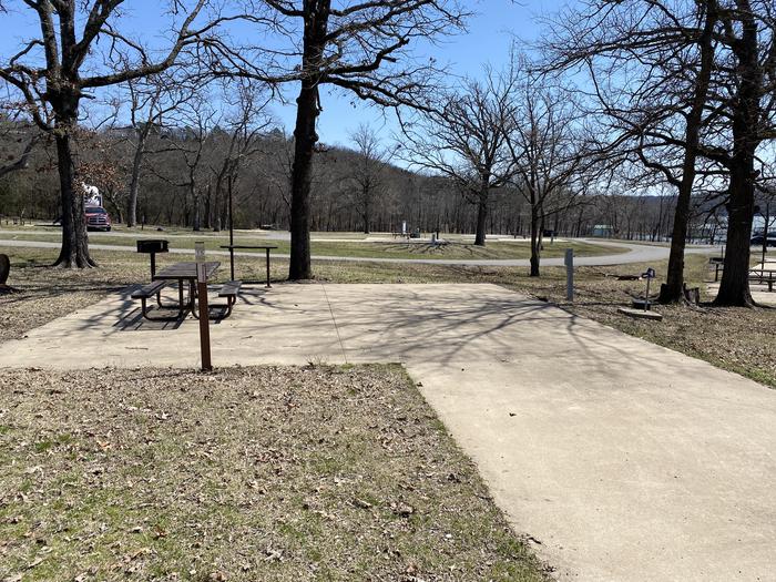 A photo of Site 15 of Loop PBA2 at PETTIT BAY with Picnic Table, Electricity Hookup, Fire Pit, Water Hookup