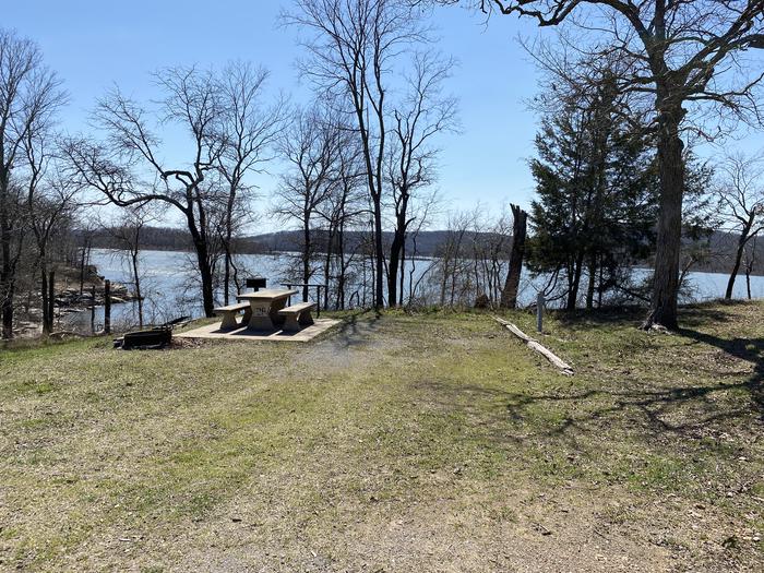 A photo of Site 28 of Loop PBA2 at PETTIT BAY with Picnic Table, Electricity Hookup, Fire Pit, Waterfront