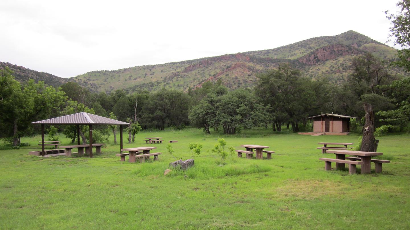 Grassy picnic area with bathroom and small ramadaWide open spaces for your gathering
