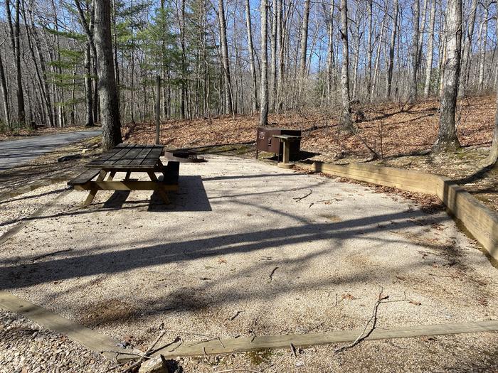 A photo of Site A26 of Loop White Oak Loop A at SHERANDO LAKE RECREATION AREA FAMILY CAMPING with Picnic Table, Fire Pit, Shade, Food Storage, Tent Pad, Waterfront
