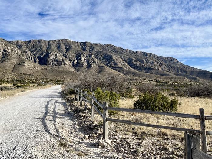 Gravel road leading into the Frijole Ranch area.  Views of the Guadalupe Mountains in the background.Road leading to Frijole Ranch.